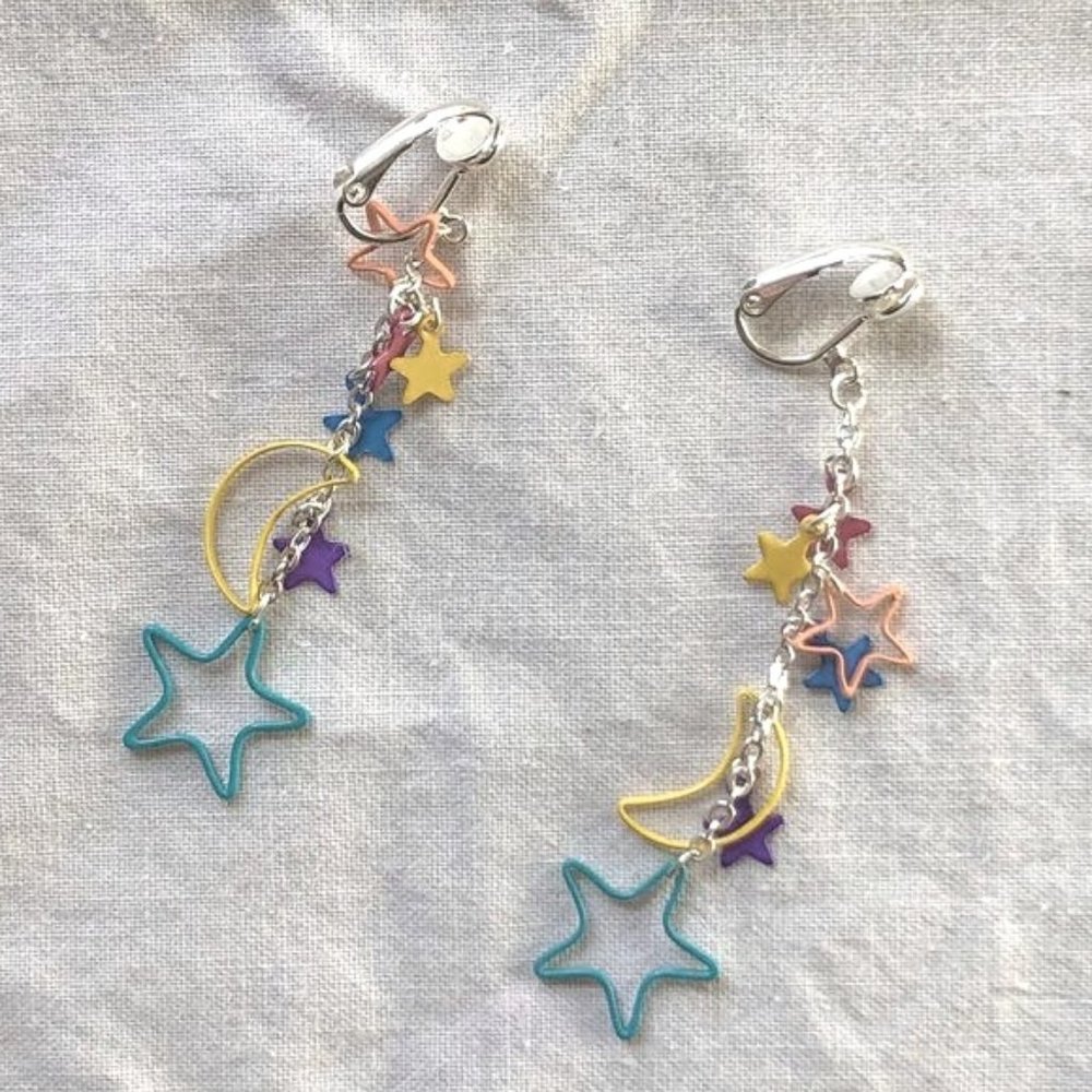 dangling star and crescent moon clip on earrings